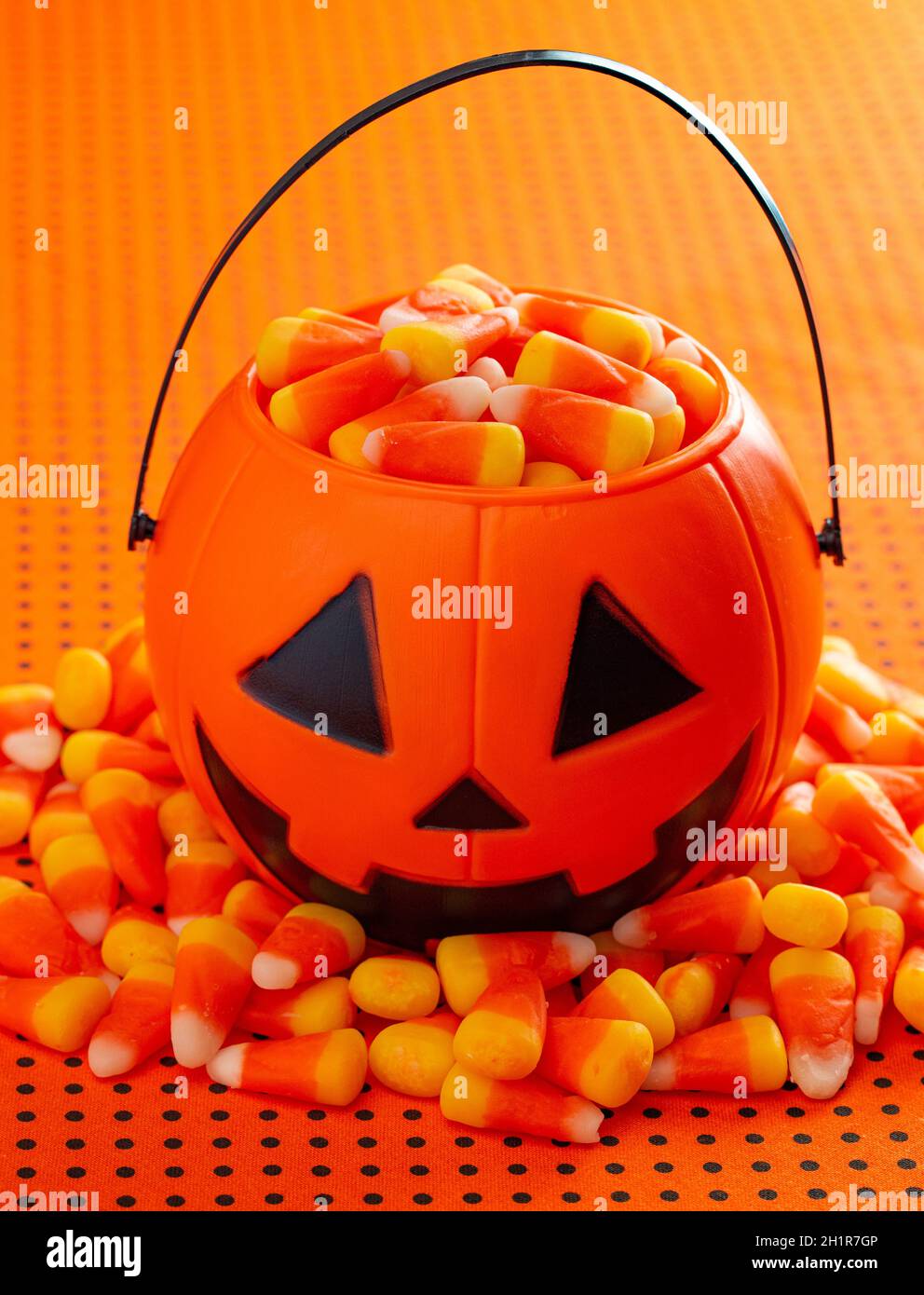Plastic Jack O Lantern Filled with Candy Corn Stock Photo - Alamy