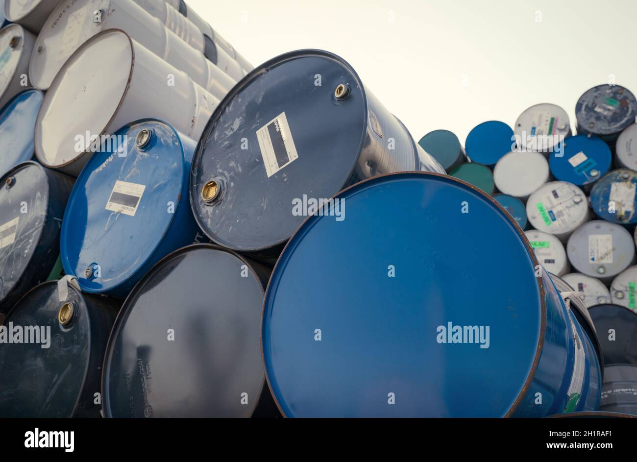 Old chemical barrels. Blue oil drum. Steel chemical tank. Toxic waste