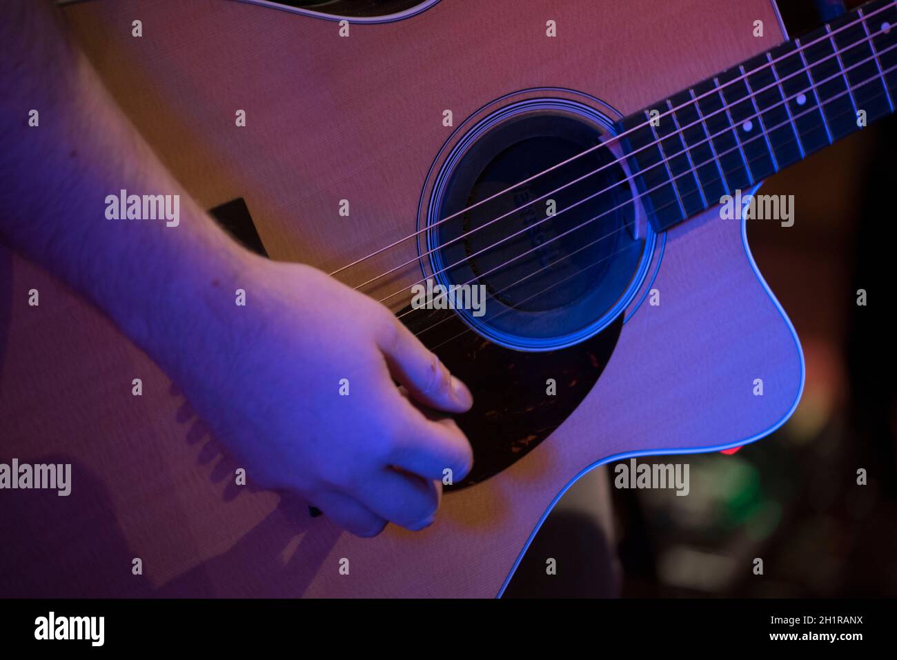 playing the guitar, a stringed instrument, musical instrument in art