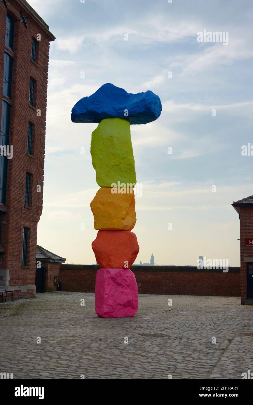 Liverpool, United Kingdom, 2nd February, 2020: Full frame image of the colorful, modern and abstract sculpture by Ugo Rondinone outside tate gallery Stock Photo
