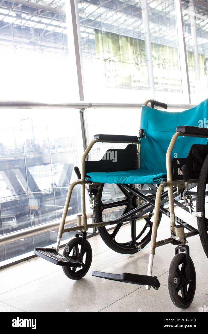 Wheelchair service in airport terminal Stock Photo Alamy
