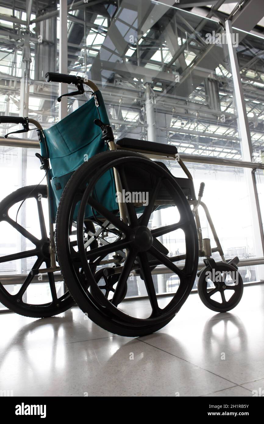 Wheelchair service in airport terminal Stock Photo Alamy