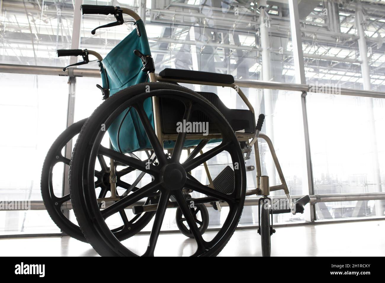 Wheelchair service in airport terminal Stock Photo Alamy