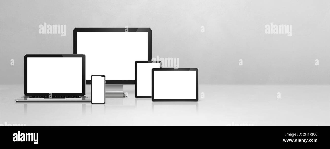 Computer, laptop, mobile phone and digital tablet pc - white concrete office desk banner. 3D Illustration Stock Photo
