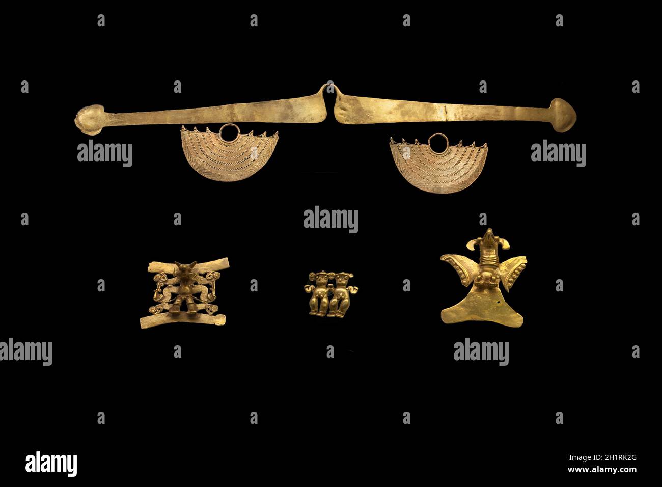 Madrid, Spain - Jul 11th, 2020: Set of gold pendants from the Diquis Culture of Costa Rica. Period IV. 1000 BC. Museum of the Americas, Madrid, Spain Stock Photo