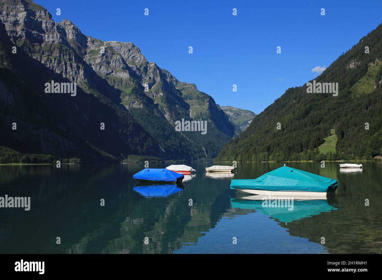 Boats on lake Klontalersee Stock Photo