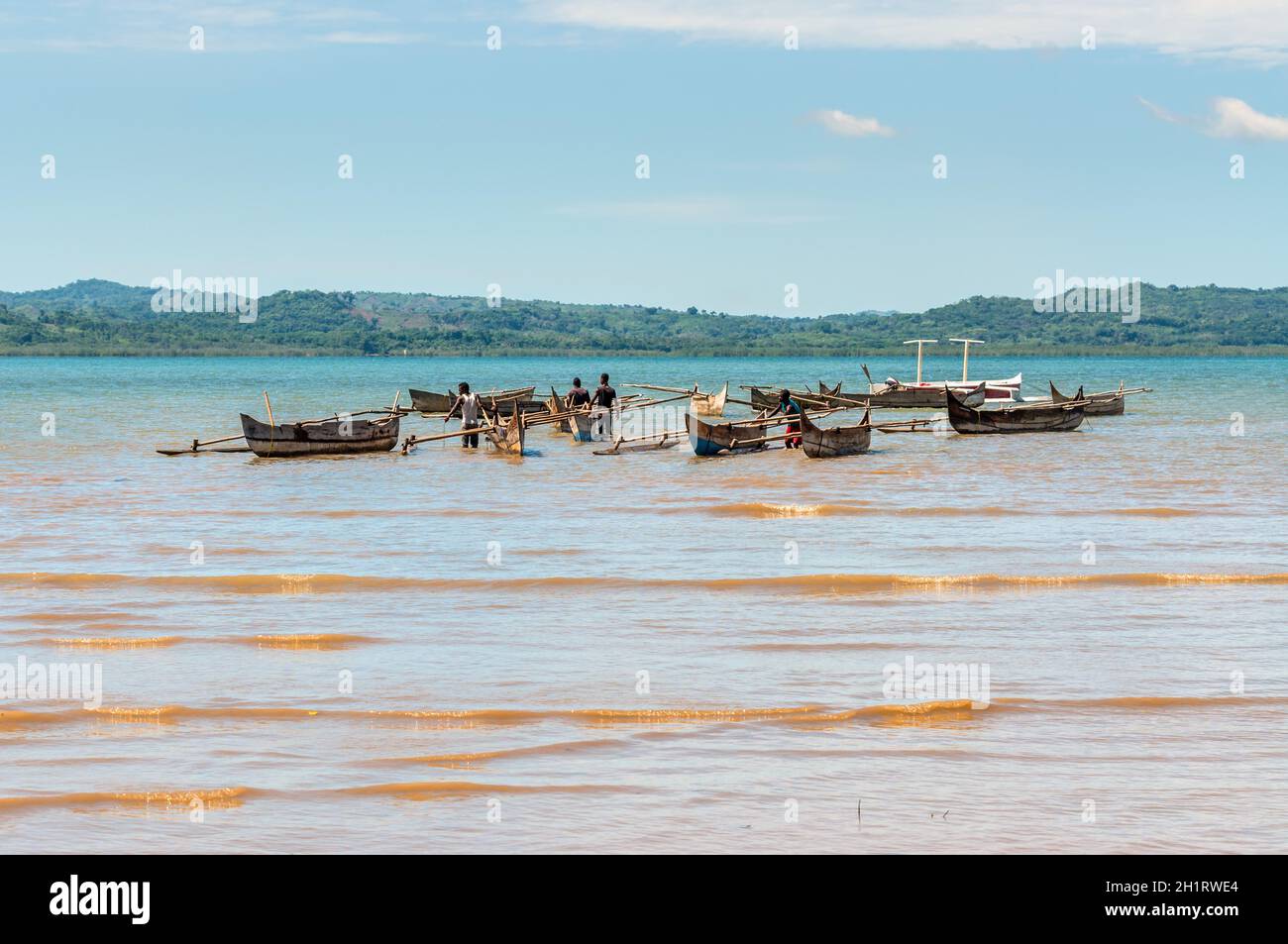 Ampasipohy, Nosy Be, Madagascar - December 19, 2015: Aboriginal traditional Malagasy pirogue - wooden outrigger canoes (carved from a tree trunk) at N Stock Photo