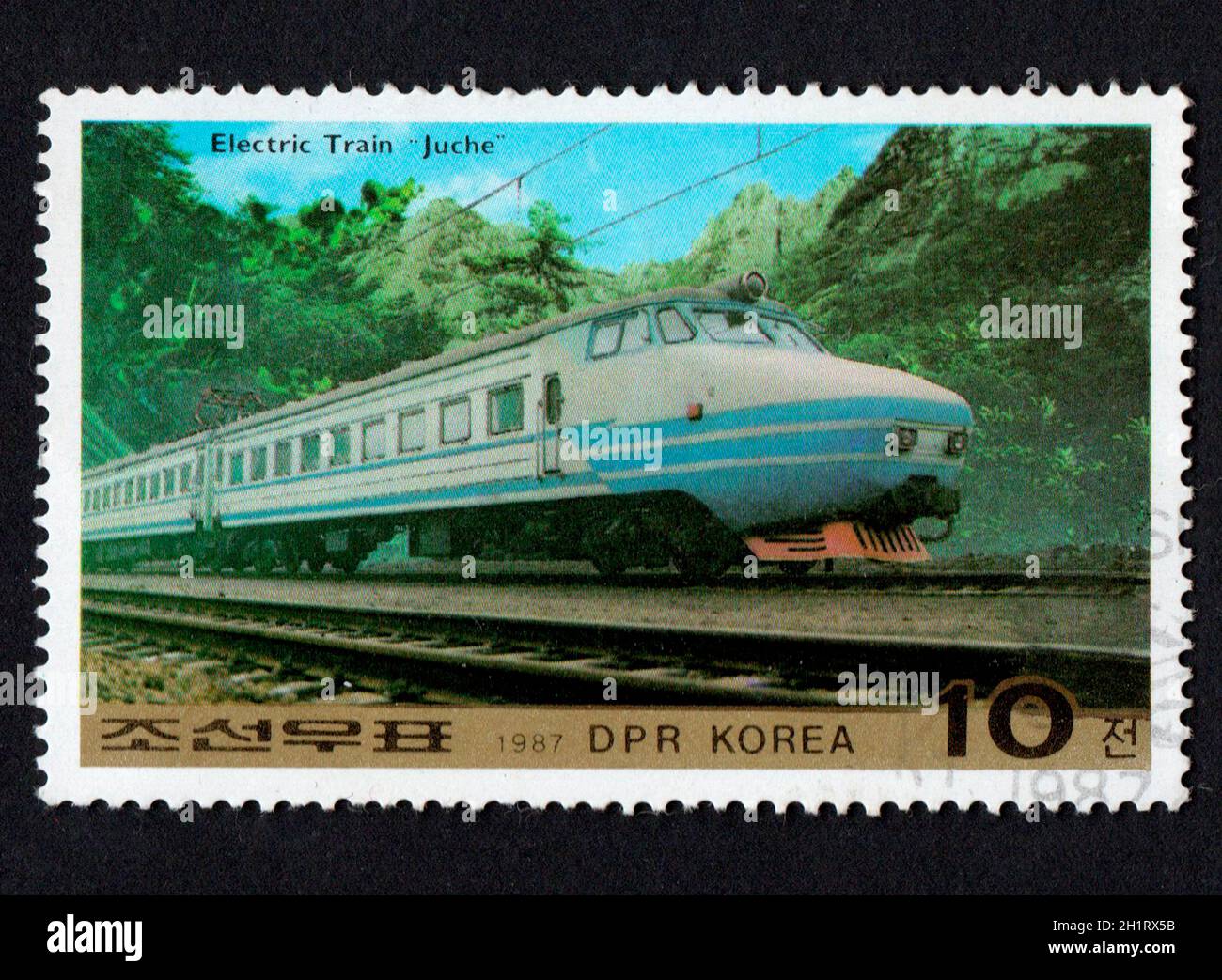 DPR Korea - CIRCA 1987: Korean stamp dedicated to railway transport. History of electric train in Korea. Electric train Juche in 1987. Railway transpo Stock Photo