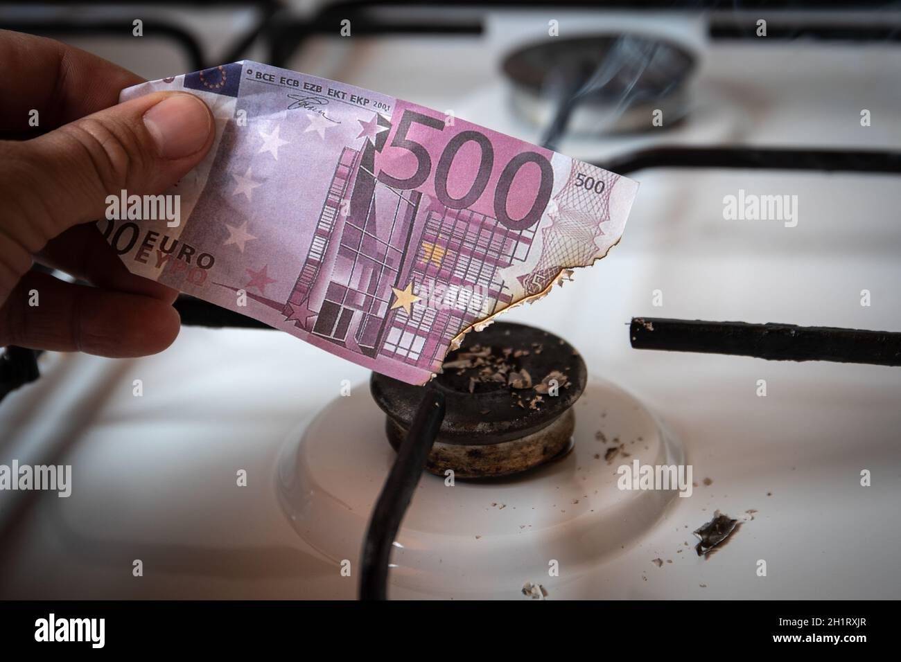 High natural gas prices. Burning money on the gas stove Stock Photo Alamy