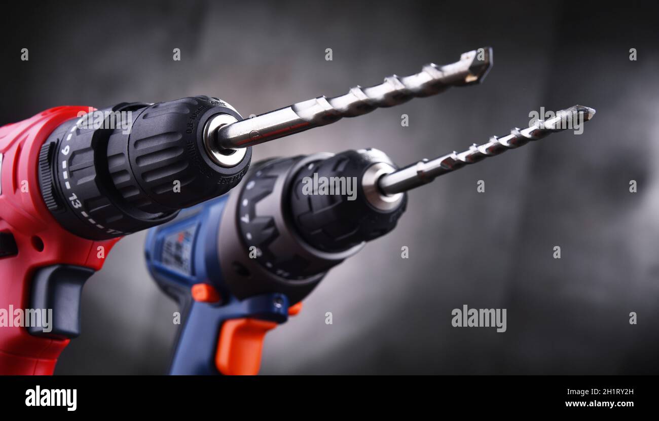 Composition with two cordless drills also working as screw guns Stock Photo