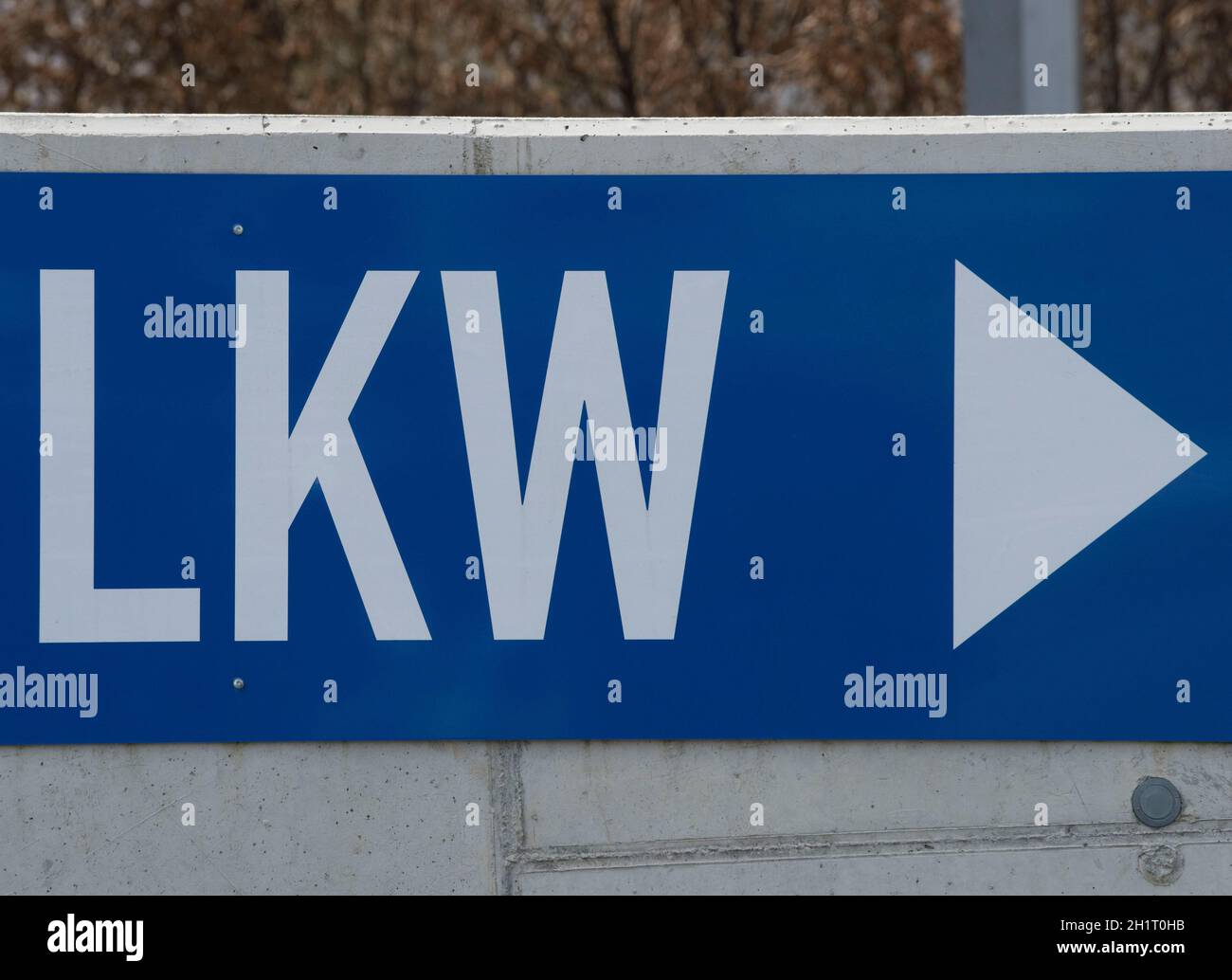 a truck or lorry sign in german (LKW) with direction arrow Stock Photo