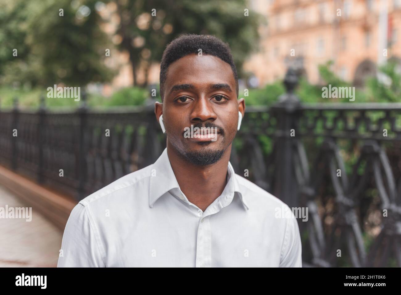 Young black african man in city face portrait Stock Photo - Alamy
