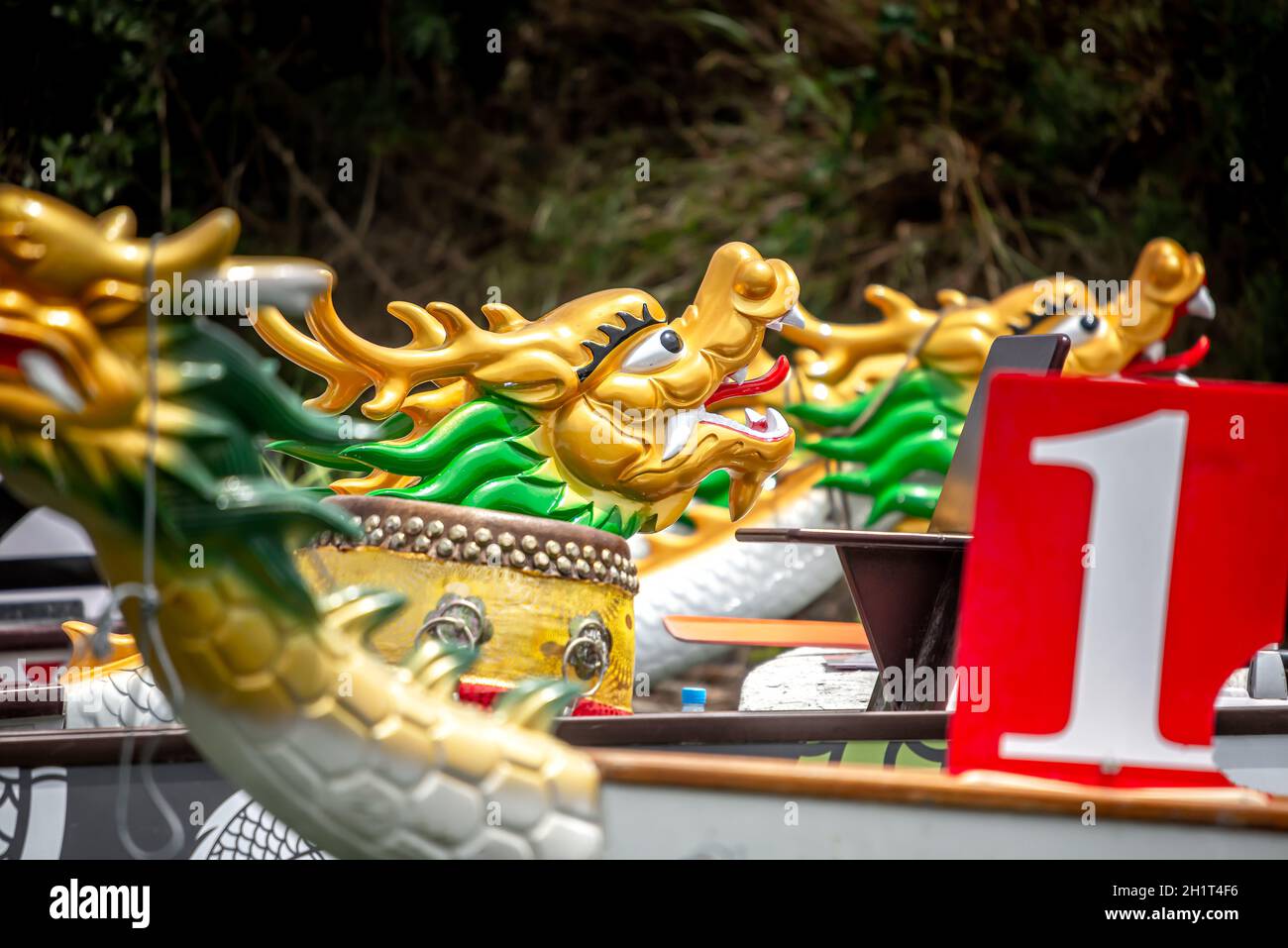 Dragon boat's heads and drum Stock Photo