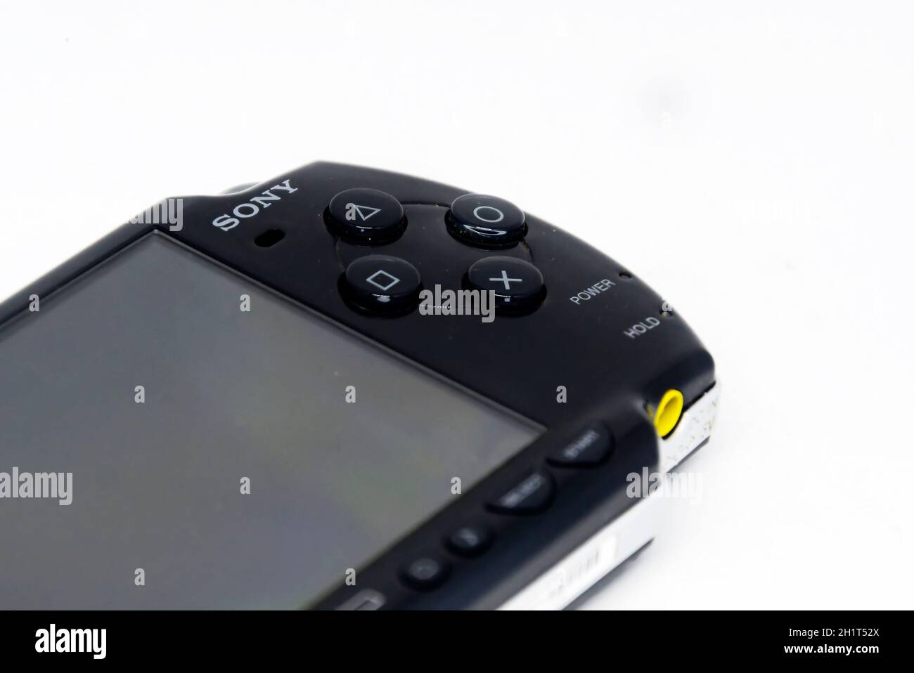 Rome, Italy, April 9th 2021: Side view of a Sony PlayStation Portable (PSP). PSP is a handheld game console developed and marketed by Sony. Mobile ent Stock Photo