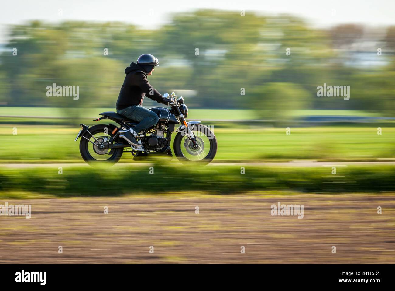 Man riding a chopper hi-res stock photography and images - Alamy