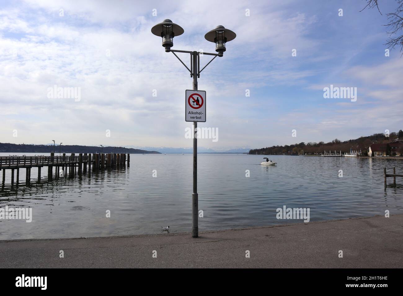 Sign of mask requirement and alcohol ban at Starnberger See, Germany Stock Photo