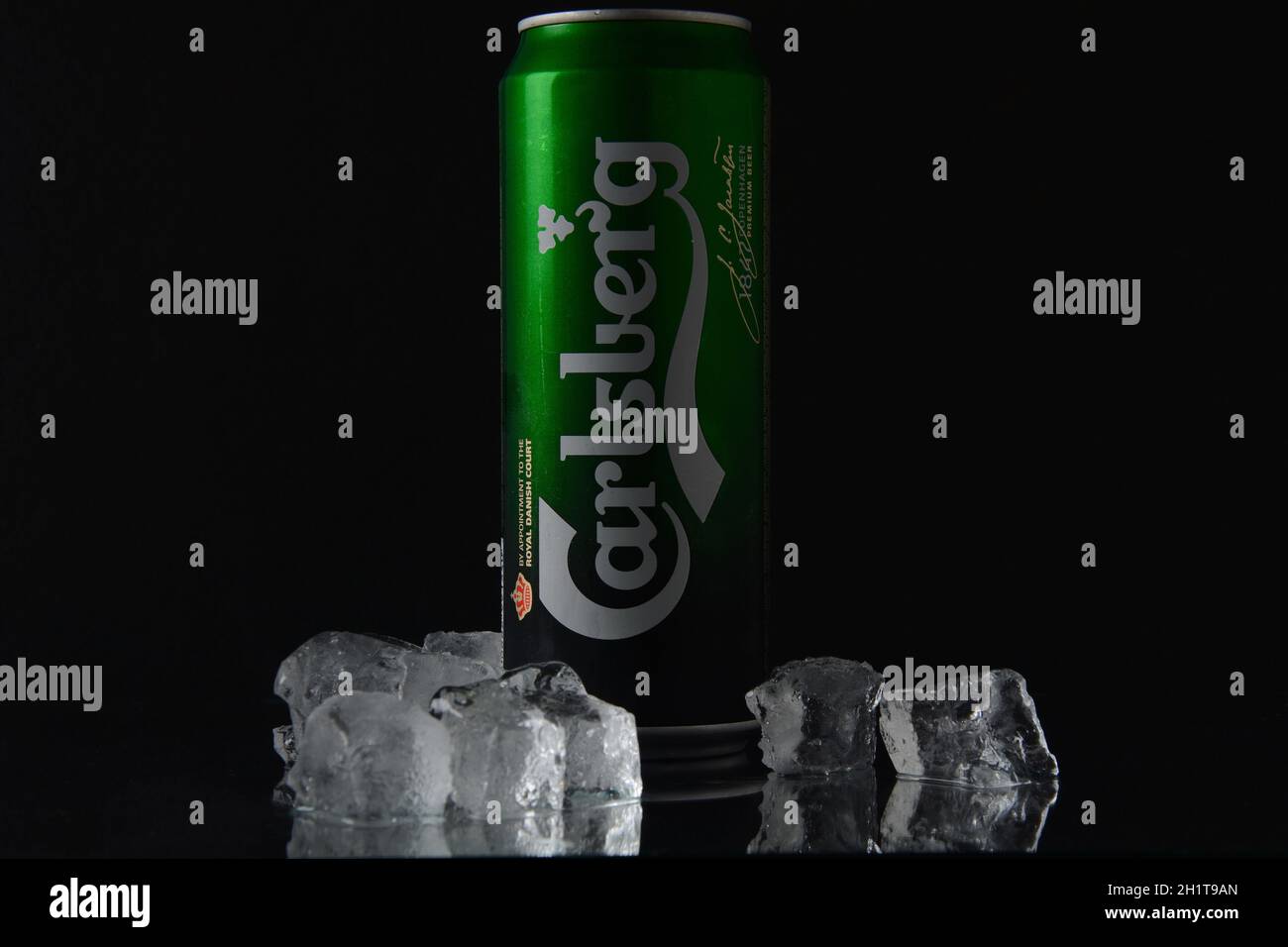 NETANYA,ISRAEL- June 29, 2020: Aluminum can of Carlsberg beer black background. Danish brewing company founded in 1847. Stock Photo
