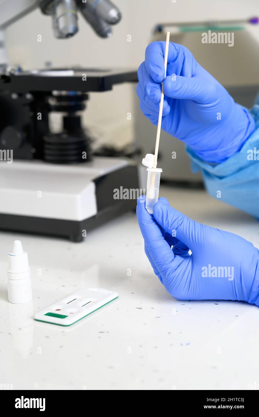 Covid-19 nasal swab laboratory test in hospital laboratory. High ...