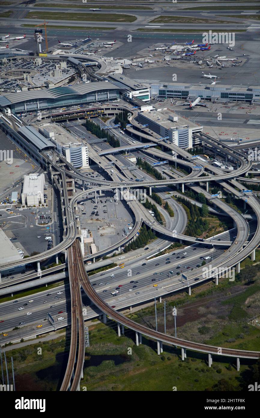 Bayshore Freeway Interchange and San Francisco International Airport, San Francisco, California, USA - aerial Stock Photo
