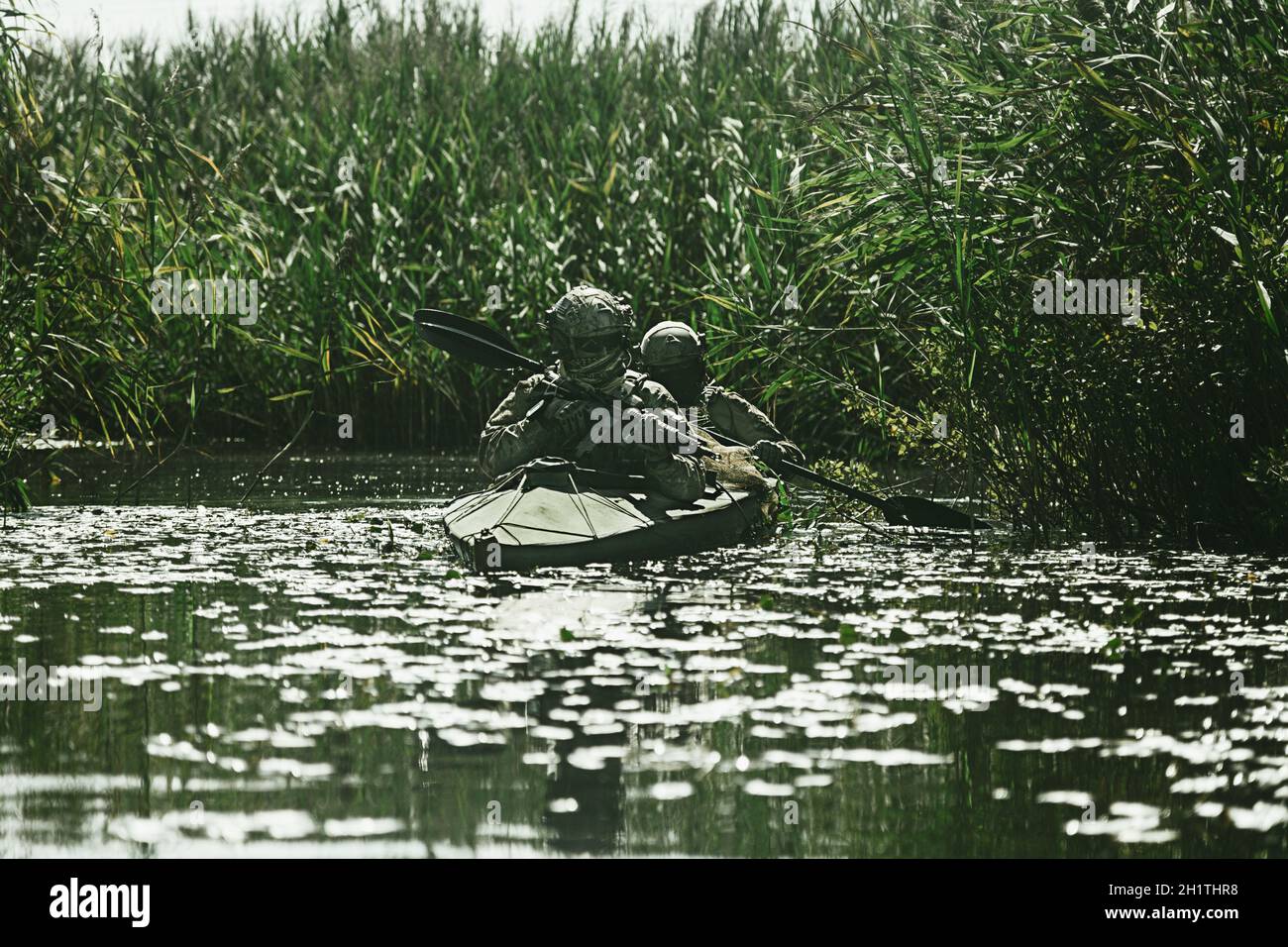 Special forces operators in the military kayak Stock Photo - Alamy