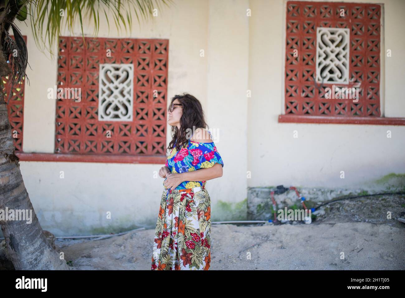 Woman walking barefoot street hi-res stock photography and images - Alamy