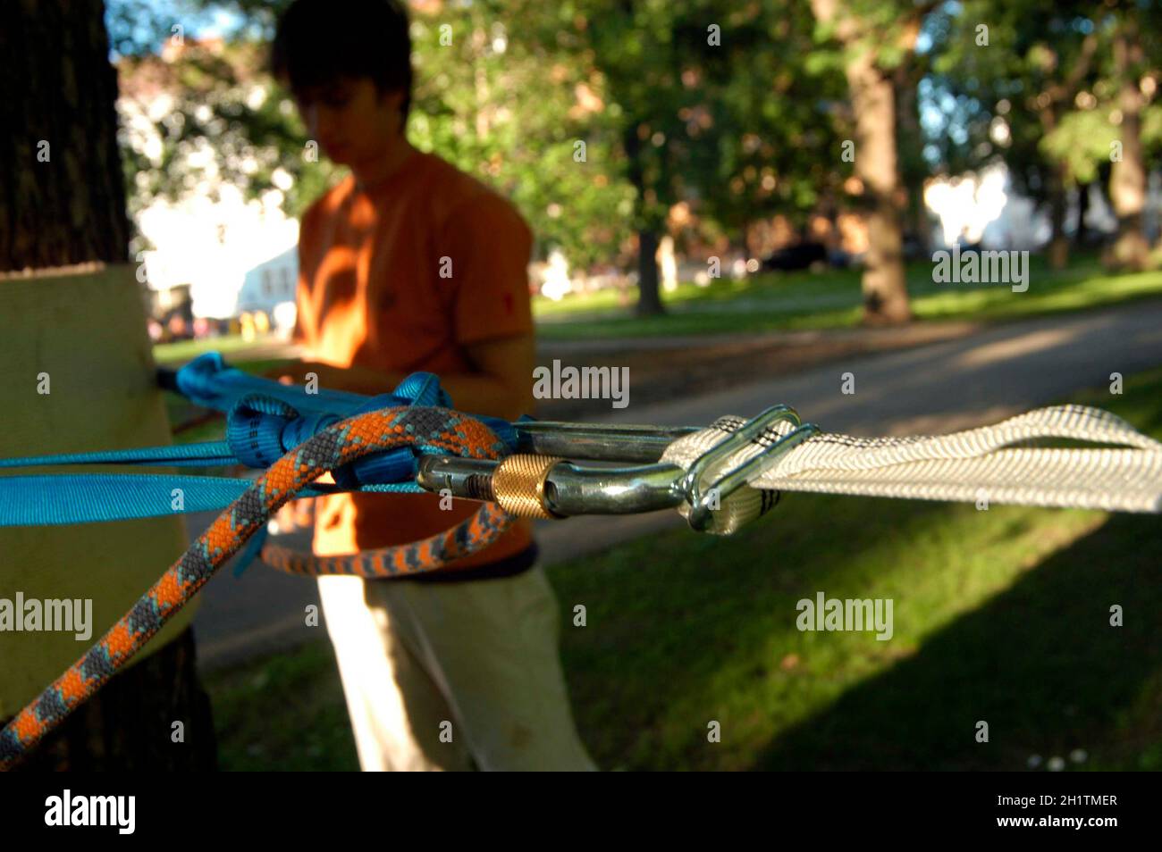 slacklining or walking on a tightrope, balancing on a rope Stock Photo Alamy
