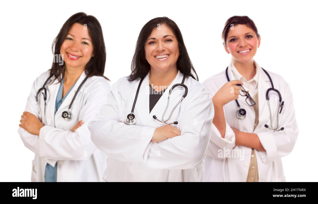 Three Hispanic Female Doctors or Nurses Isolated on a White Background. Stock Photo