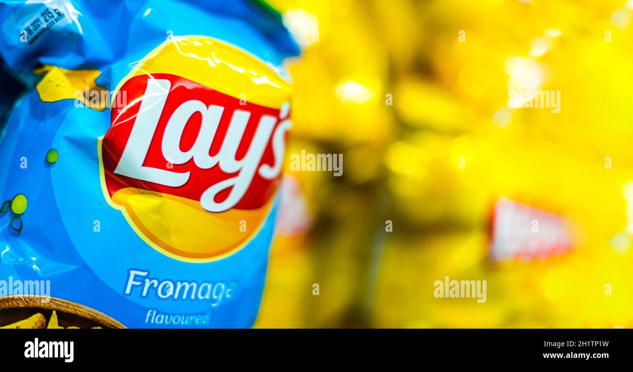 POZNAN, POL APR 13, 2021 Packets of Lay's potato chips, popular