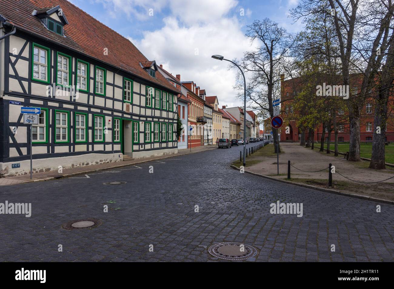 STENDAL, GERMANY - APRIL 24, 2021: Houses and buildings on the streets in the old town. Hansestadt Stendal is a medieval town in Saxony-Anhalt state. Stock Photo