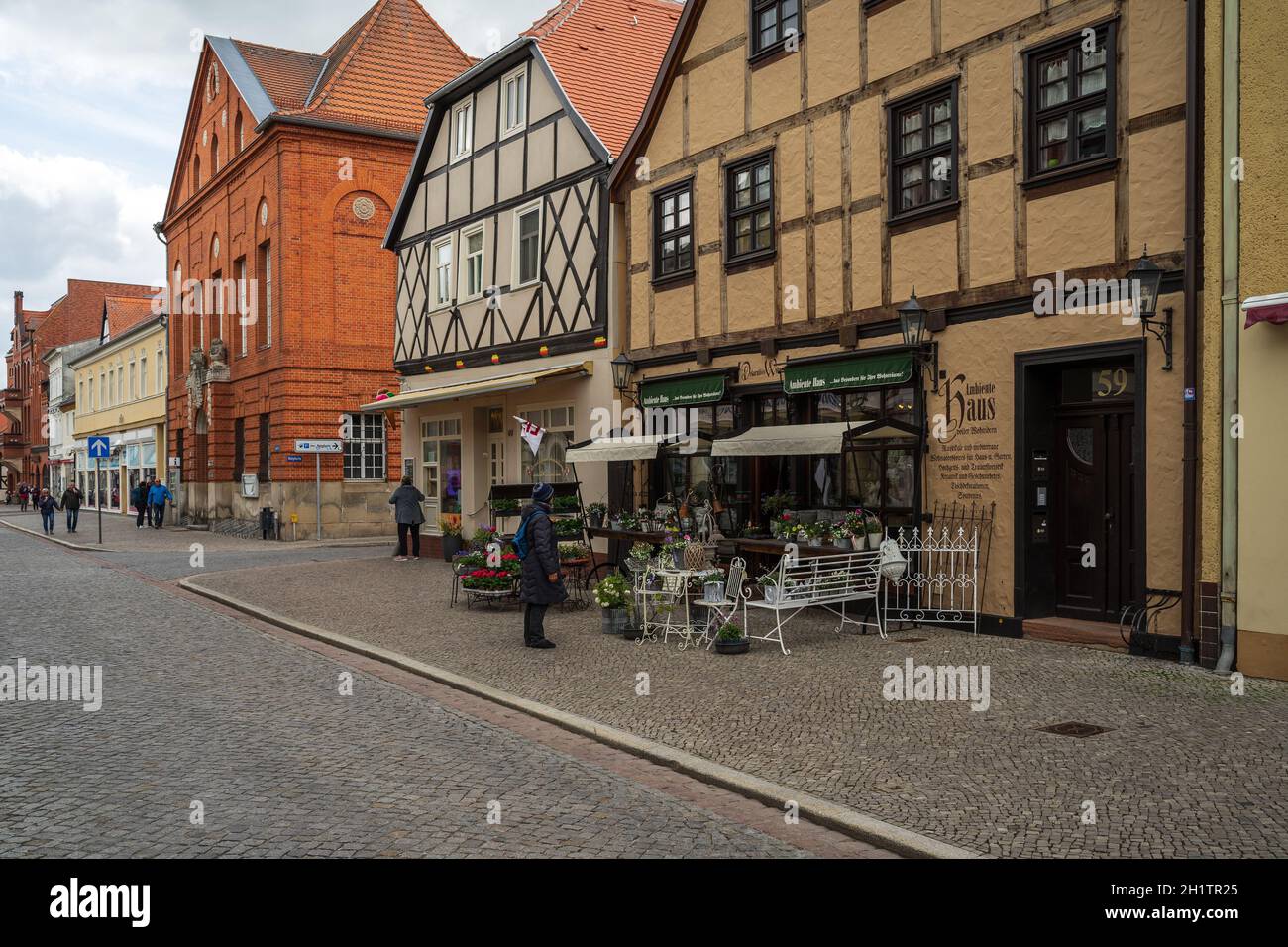 TANGERMUENDE, GERMANY - APRIL 24, 2021: Flower shop on old street of a historic town of Tangermuende. Saxony-Anhalt state. Stock Photo
