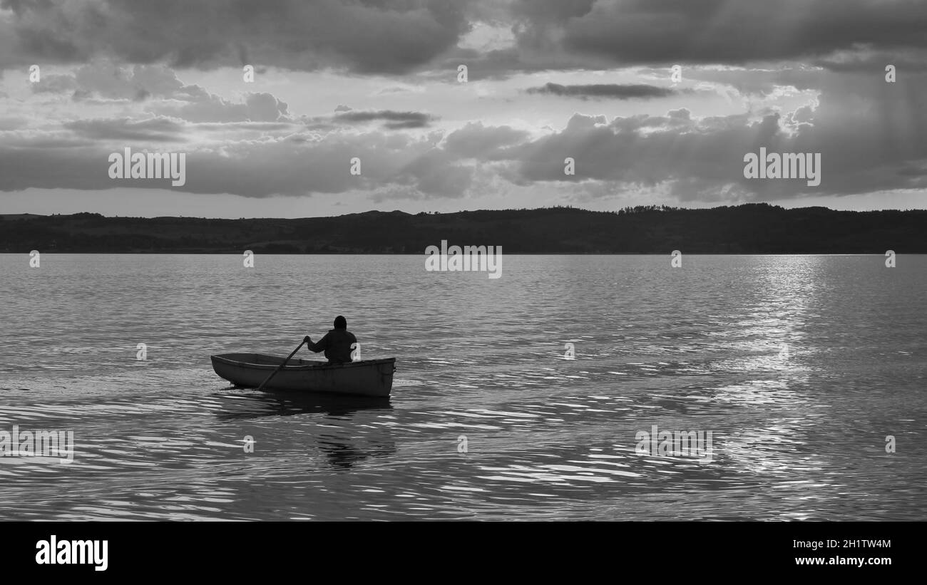 Blue rowing boat Black and White Stock Photos & Images - Alamy