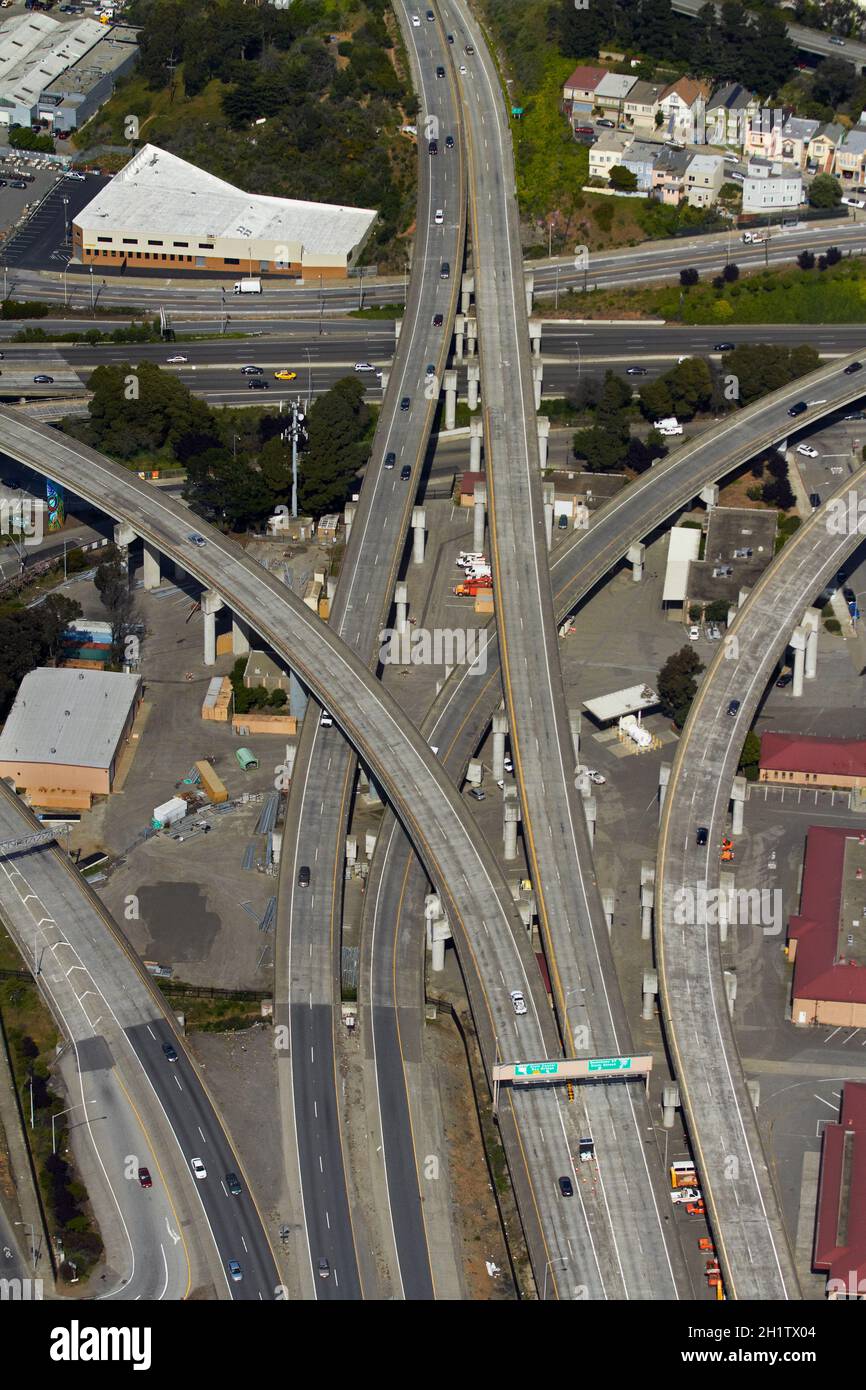 Aerial of Alemany Maze interchange, James Lick Freeway (aka U.S. Route 101, US 101, Bayshore Freeway), San Francisco, California, USA - aerial Stock Photo