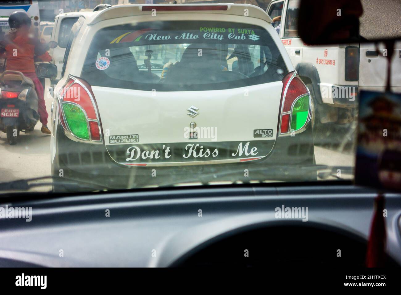 KATHMANDU, NEPAL - CIRCA FEBRUARY 2018: Don't kiss me sticker on the back of a taxi. Stock Photo
