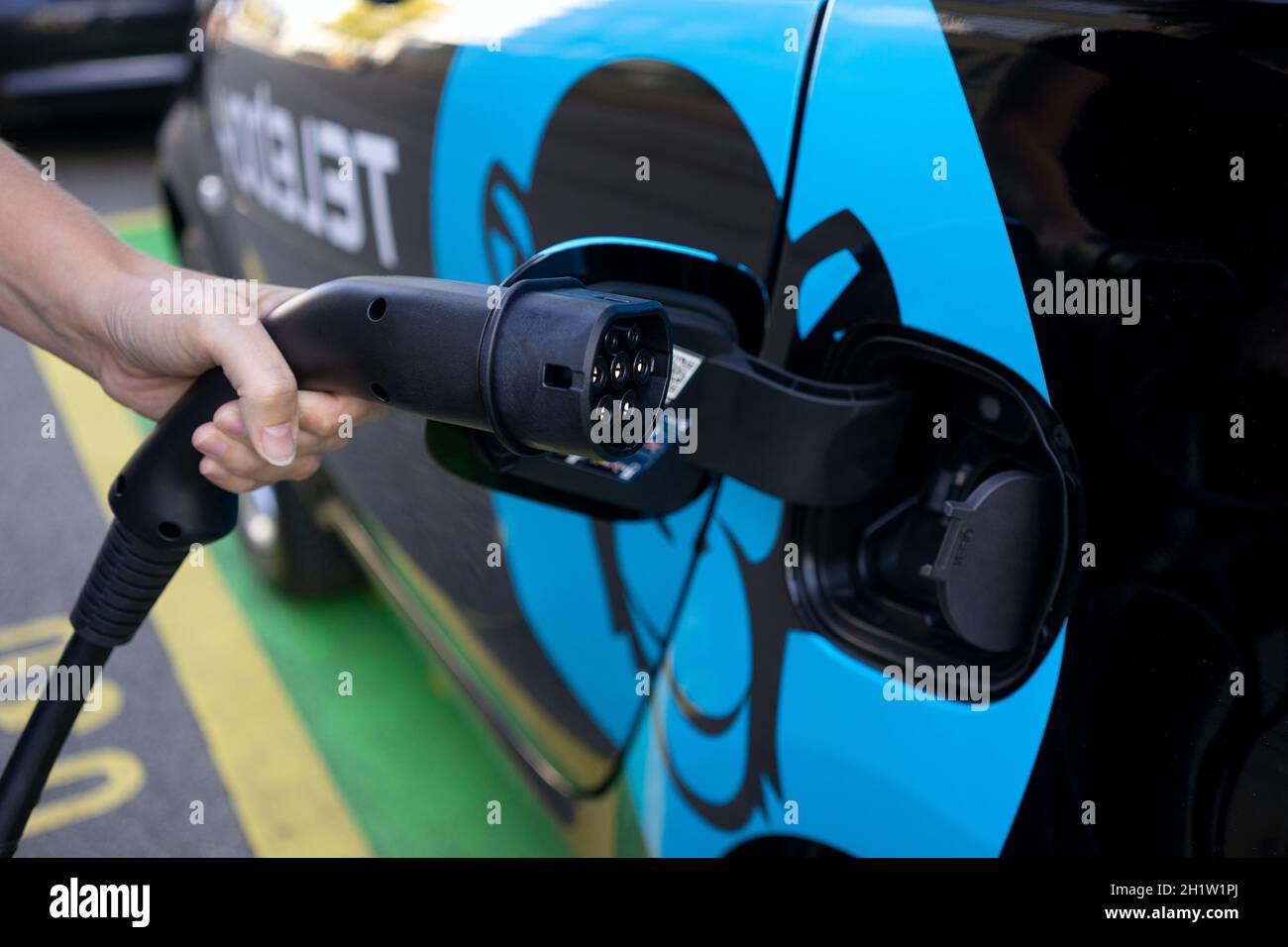 Electric car charging Stock Photo Alamy