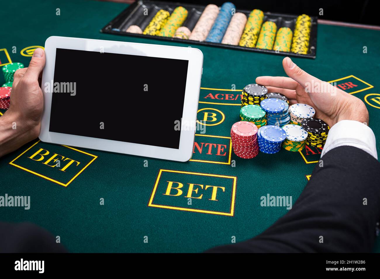 casino, online gambling, technology and people concept Stock Photo - Alamy