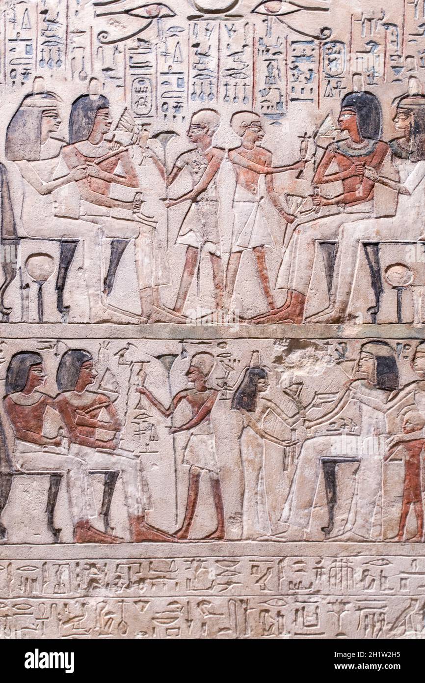 Egyptian hieroglyphs and ancient drawings on clay tablets and papyri background. The art of Egypt and the ancient civilizations of Africa. High quality photo Stock Photo