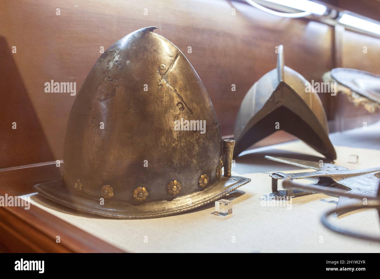 Madrid, Spain - March 6th, 2021: Spanish cabasset, 16h Century pointed helmet. Naval Museum of Madrid, Spain Stock Photo