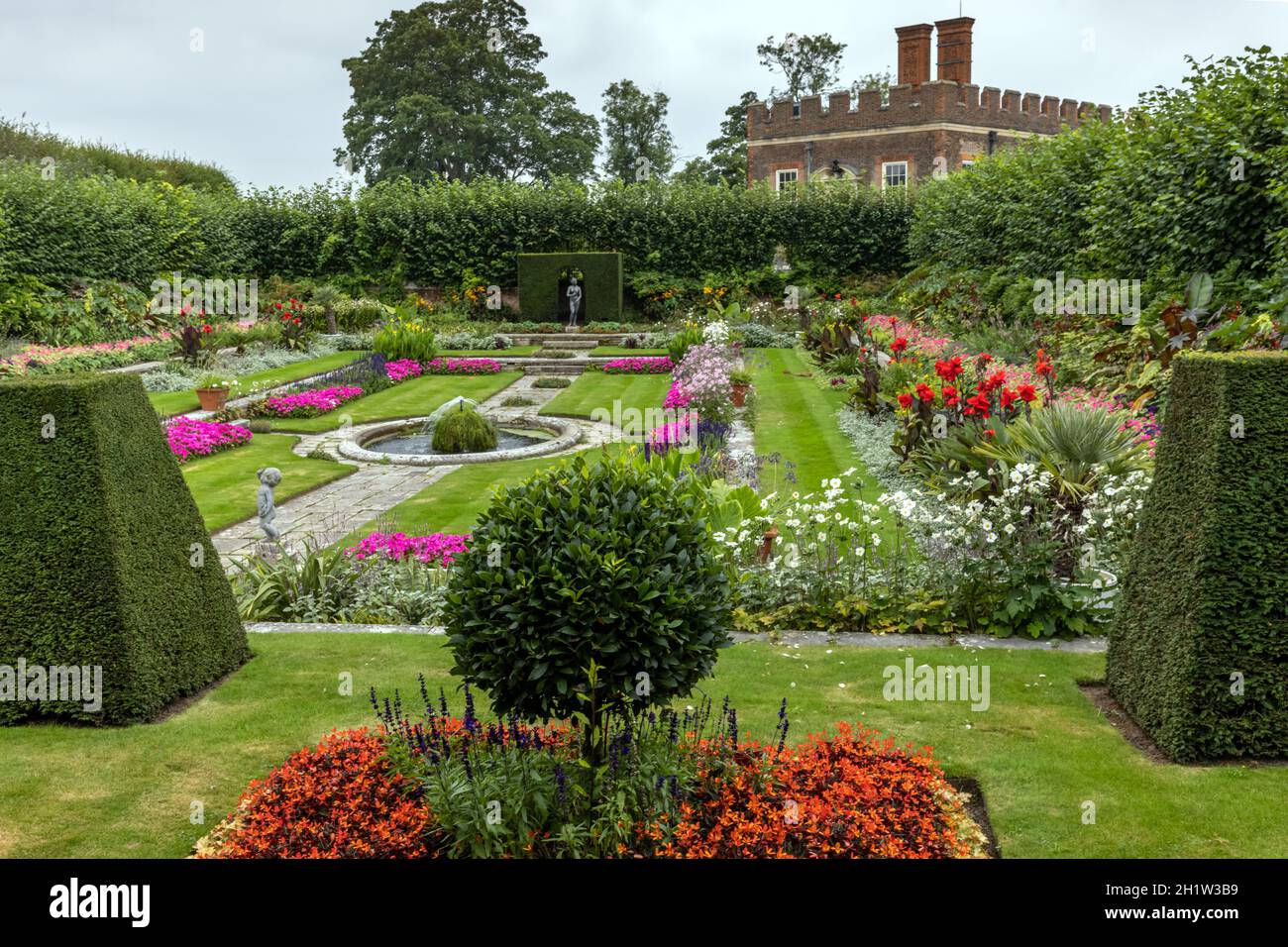 Ornamental sunken garden and banqueting house at Hampton Court Palace Surrey west London. Stock Photo