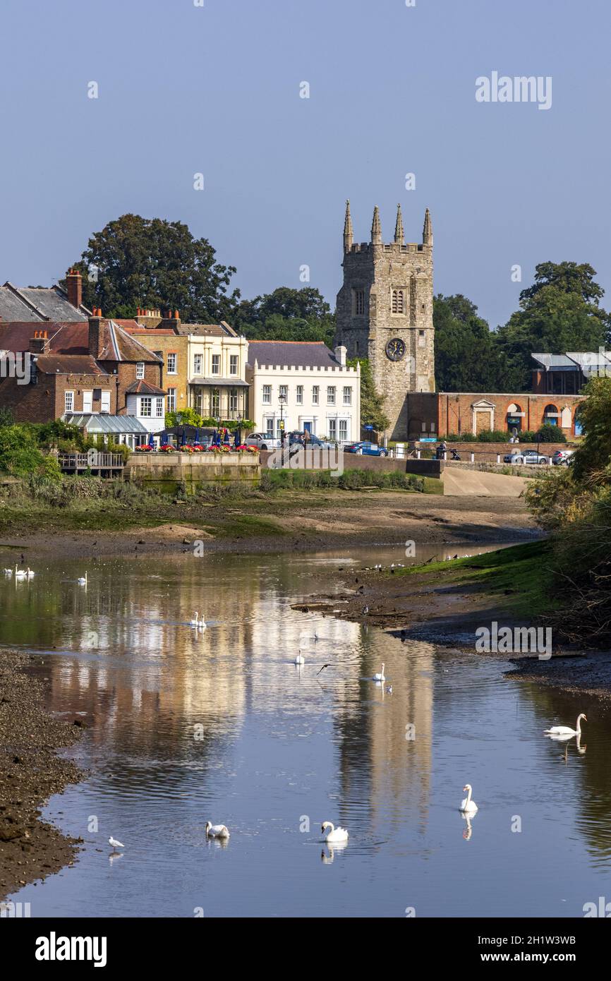 The River Thames at Isleworth at low tide, All Saints Church in the background, the London Apprentice pub on the left and Isleworth Ait on the right. Stock Photo