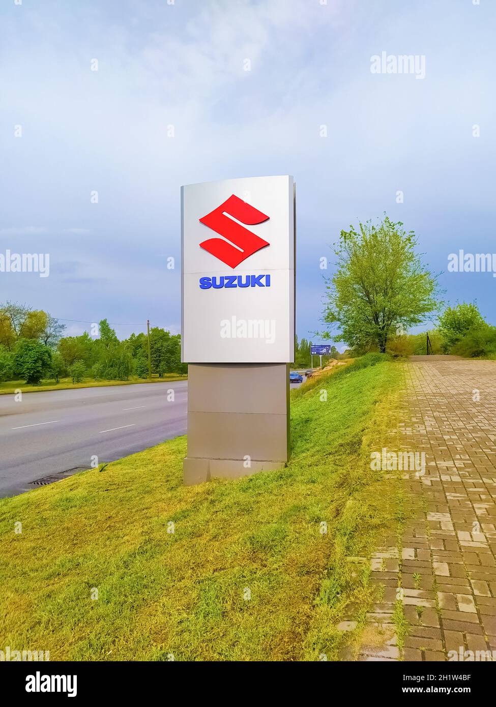 Kyiv, Ukraine - August 15, 2020: Suzuki logo at store at Kyiv, Ukraine on August 15, 2020. Suzuki Motor Corporation is a Japanese multinational corpor Stock Photo
