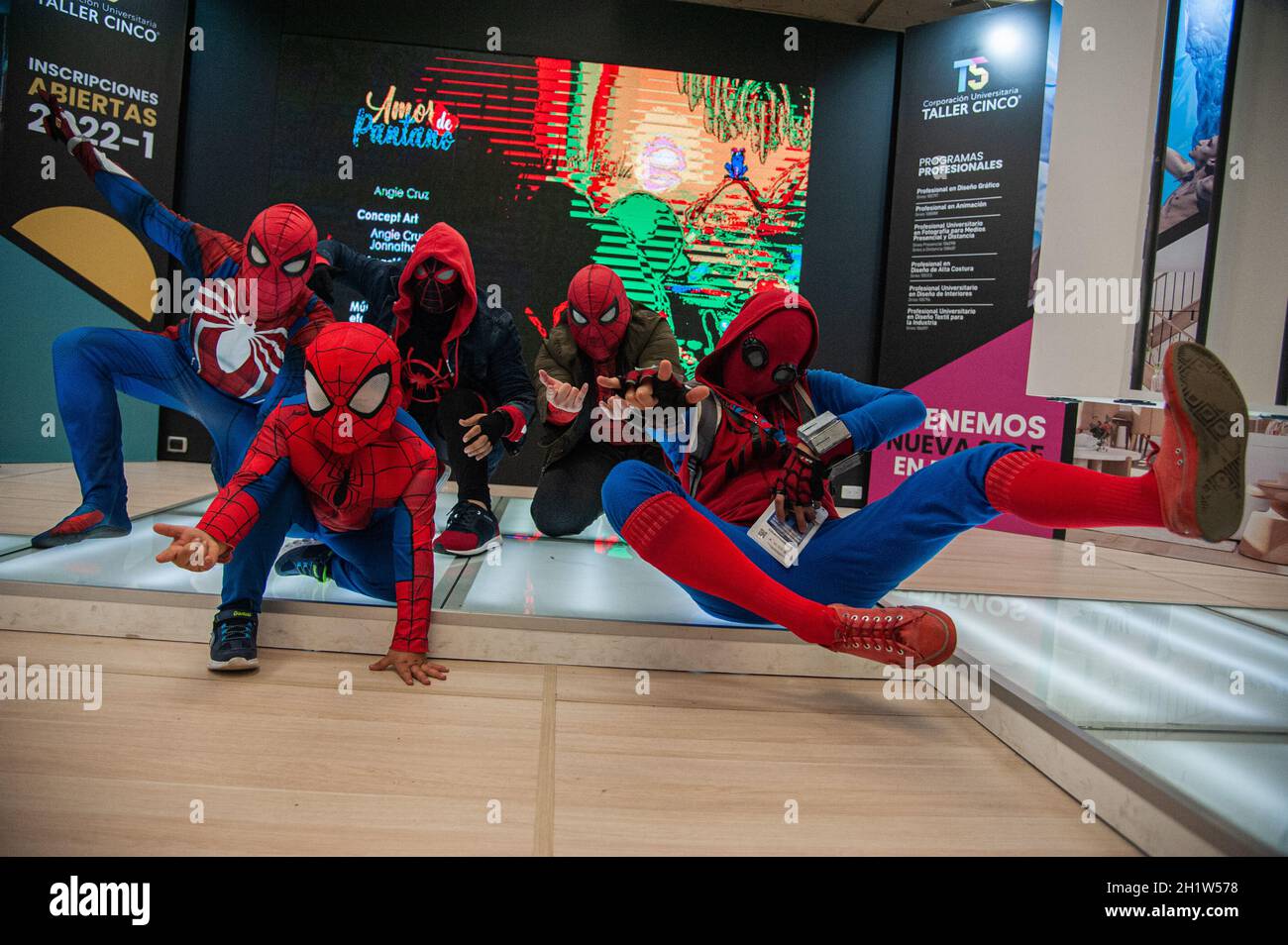 Bogota, Colombia, October 18, 2021. Several people cosplay different versions of Marvel's superhero Spider Man during the last day of the SOFA (Salon del Ocio y la Fantasia) 2021, a fair aimed to the geek audience in Colombia that mixes Cosplay, gaming, superhero and movie fans from across Colombia, in Bogota, Colombia on October 18, 2021. Stock Photo