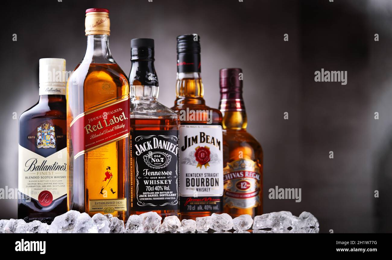 POZNAN, POL - MAY 12, 2021: Bottles of popular global whiskey brands Stock Photo