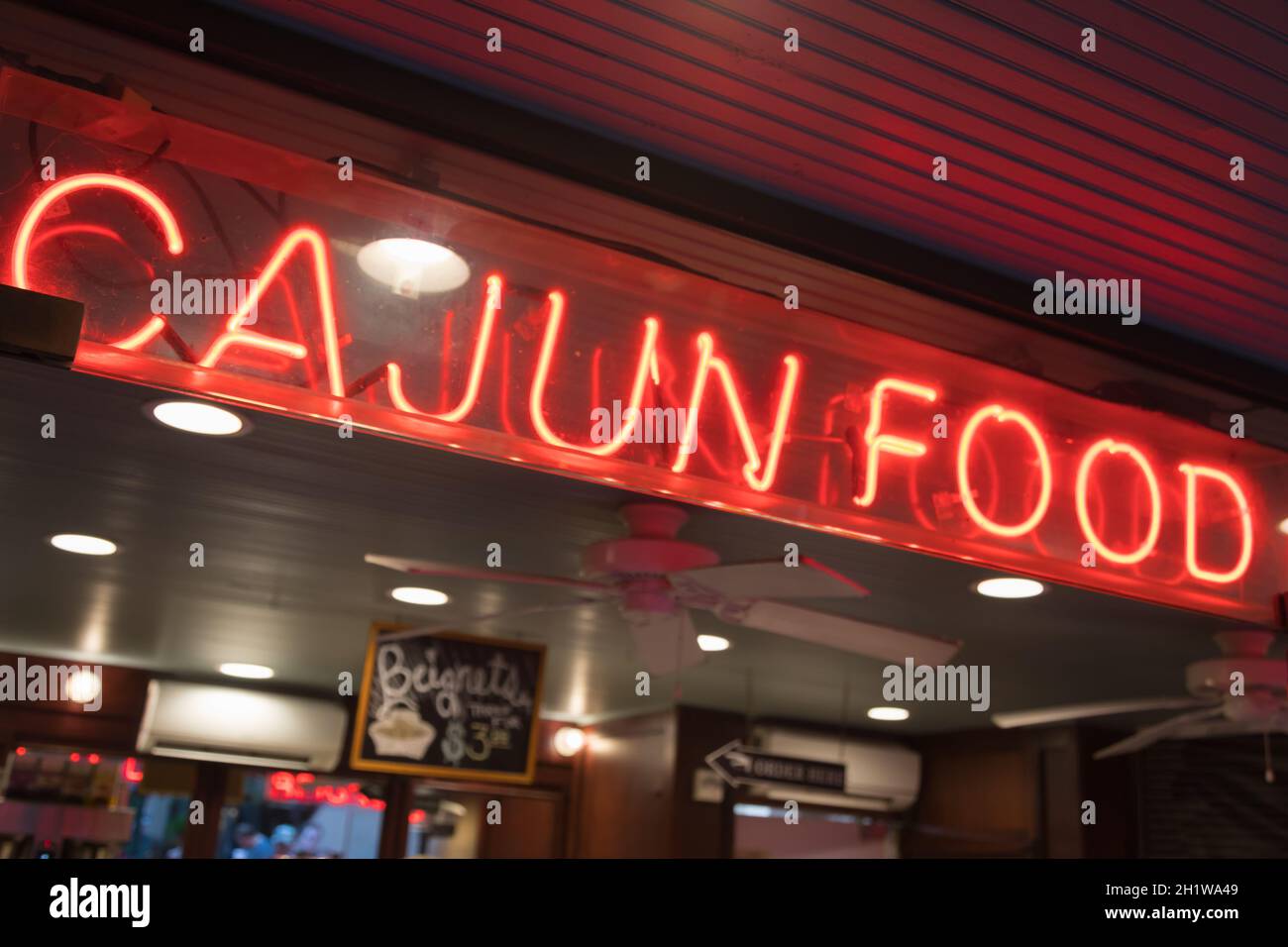 Cajun Food Neon Sign in New Orleans, Louisiana Restaurant Stock Photo