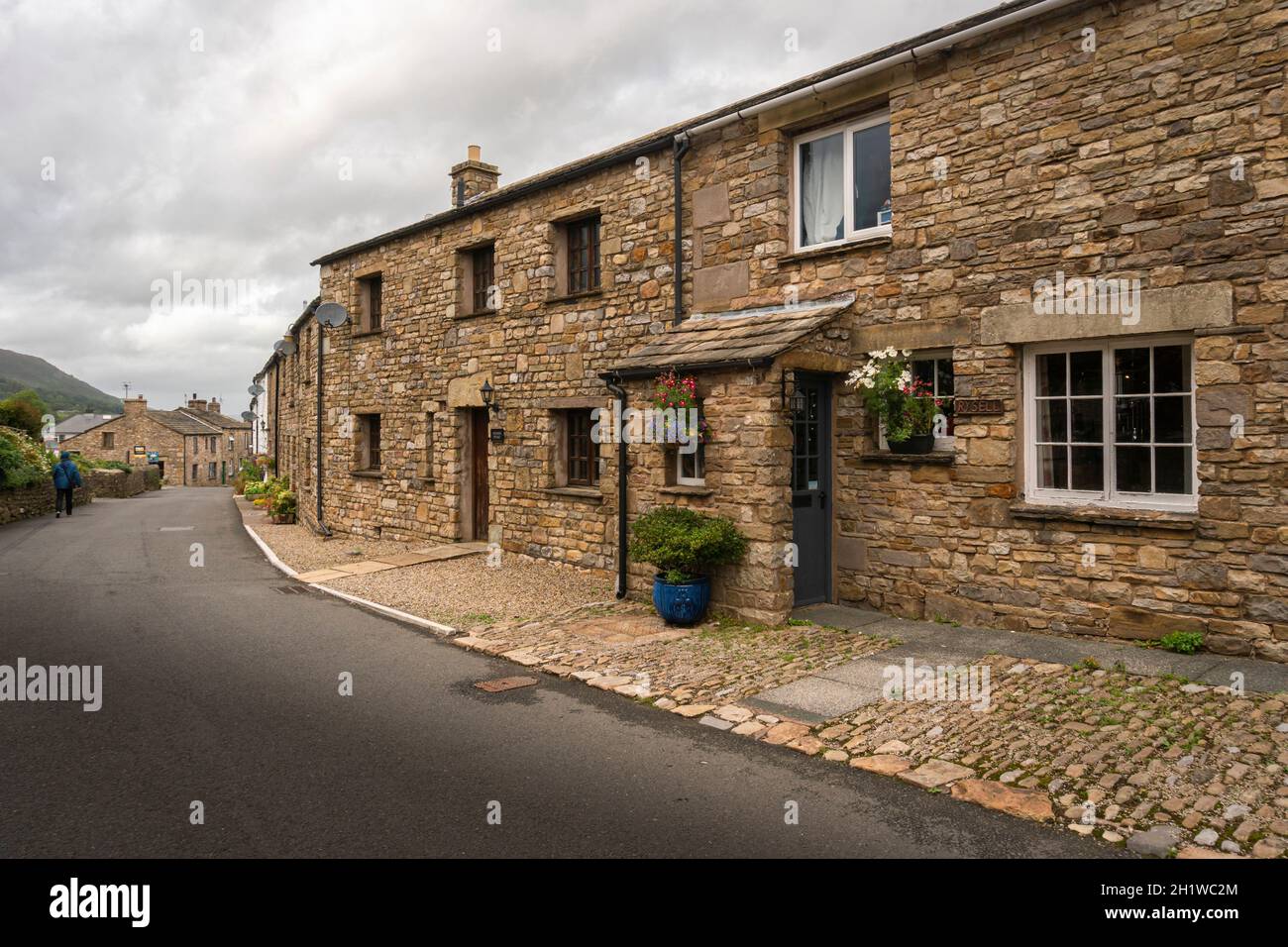 Facade of stone buildings in the village of Dent, Cumbria, UK Stock
