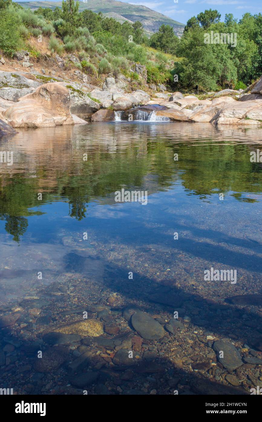Acebo natural swimming pool. Crystal-clear waters spot in the heart of Sierra de Gata hills. Caceres, Extremadura, Spain Stock Photo