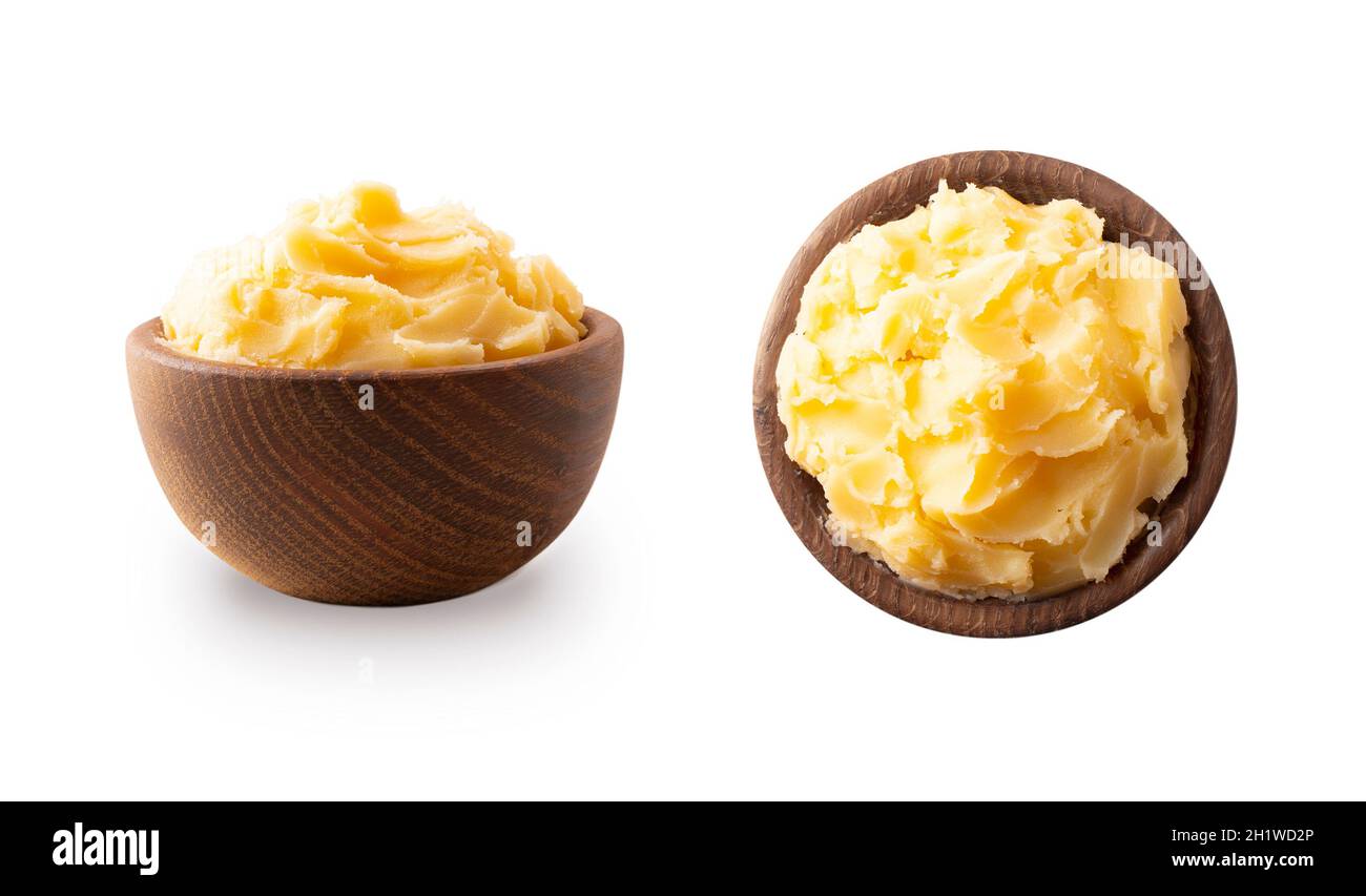 Ghee or clarified butter in wooden bowl, cooking oil, pure ghee