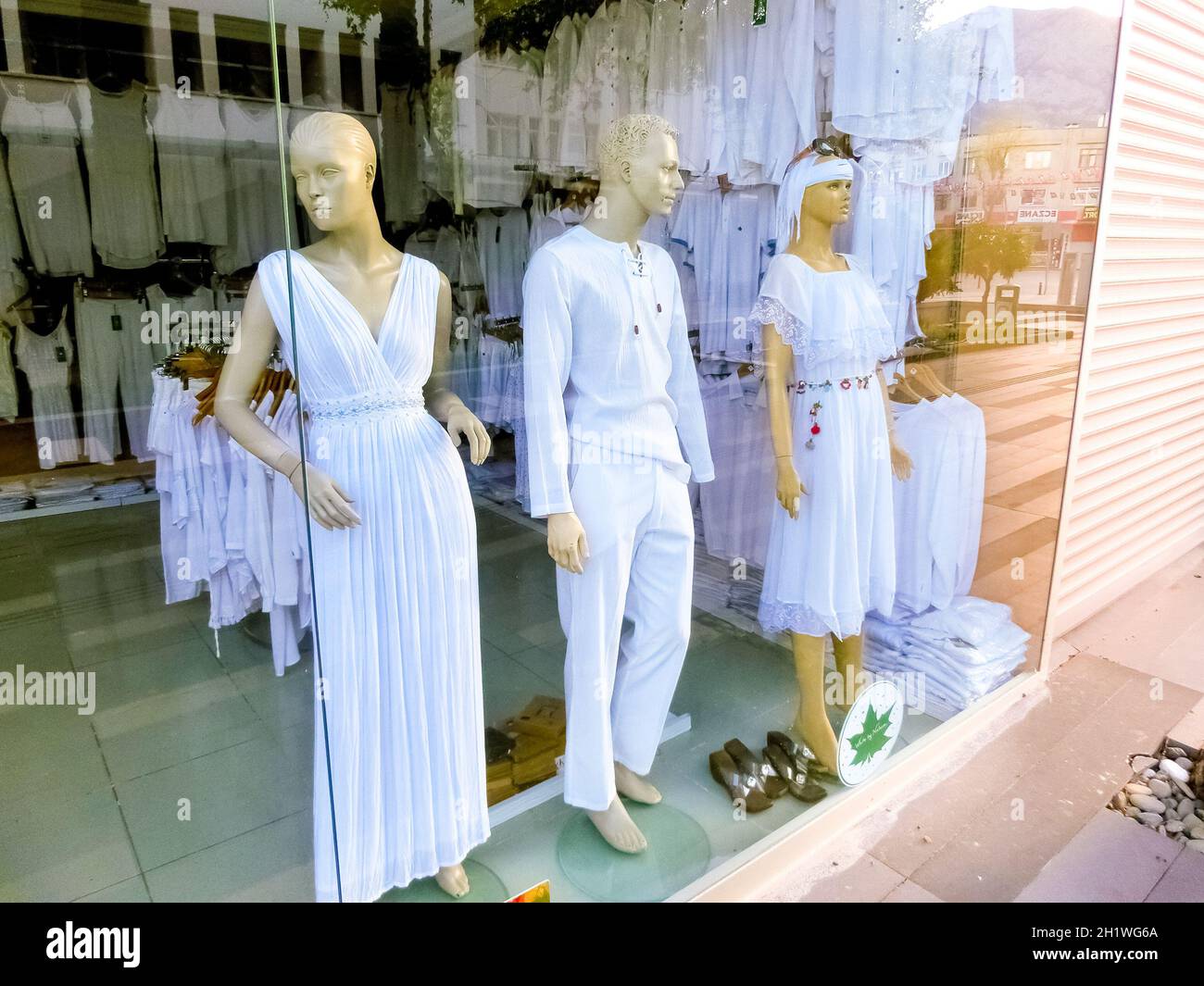 Antalya, Turkey - May 11, 2021: The white cotton clothes - dress, blouses,  pants at shop or store at Antalya, Turkey on May 11, 2021 Stock Photo -  Alamy