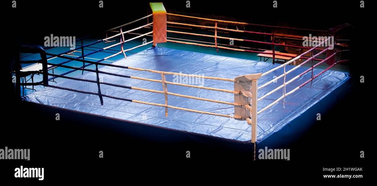 The modern Professional boxing ring illuminated in the middle Stock Photo -  Alamy