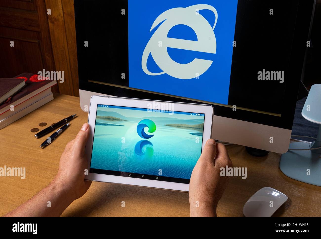 Udine, Italy, August 2021. the symbol of the new Microsoft Edge browser on  a tablet screen with the symbol of Internet Explorer on a computer screen  Stock Photo - Alamy
