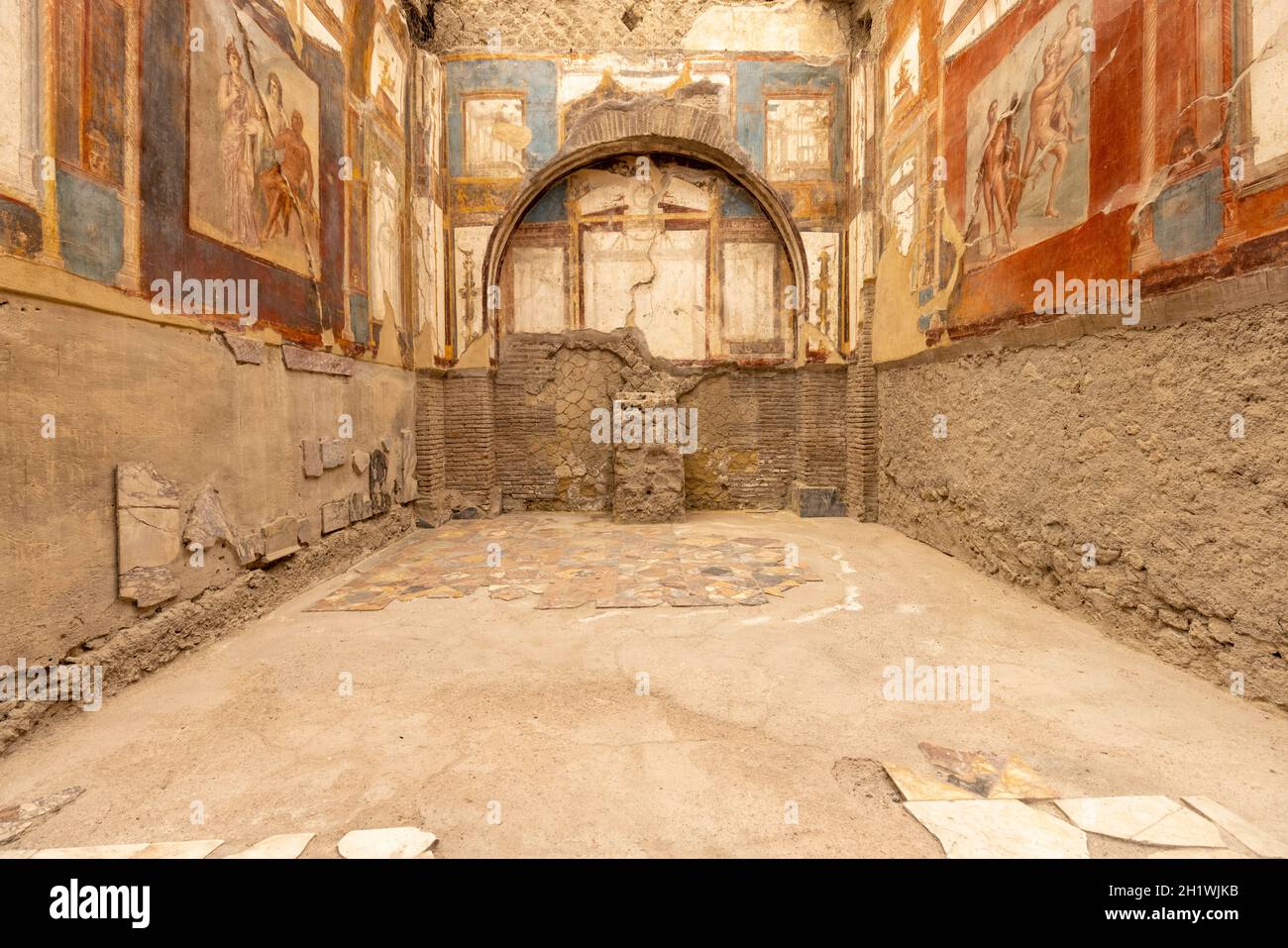 Herculaneum, Campania, Italy - June 29, 2021: Colorful frescoes on the walls of Collegio Augustali at Archaeological Park of Ercolano Stock Photo
